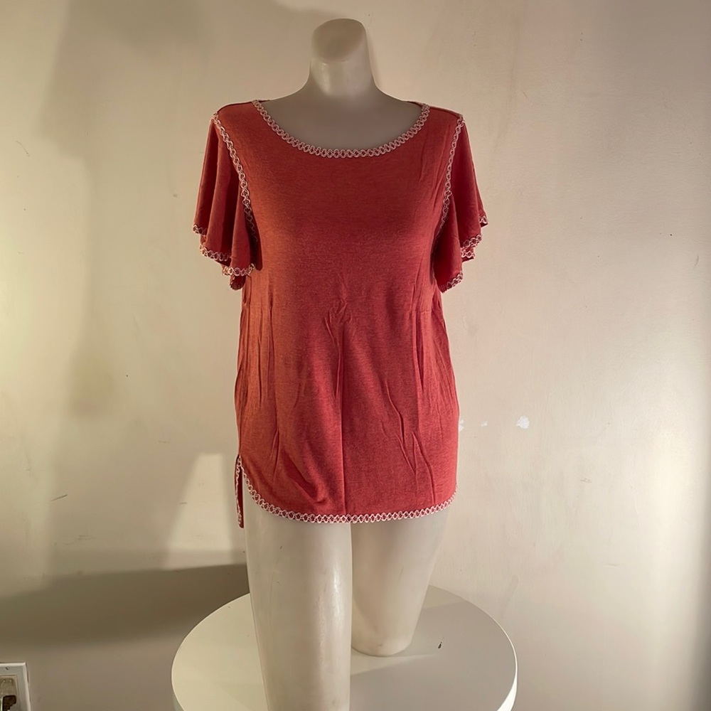 Woman’s shirt by Max Studio.  Gypsy style with embroidered edging detail.